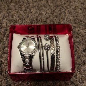 Brand new watch and bracelet set. Very cute